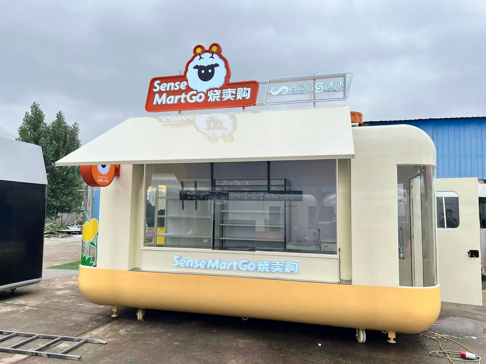 Rounded retail kiosk at the factory
